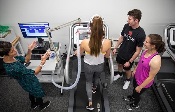 Exercise Science students with treadmill and metabolic cart